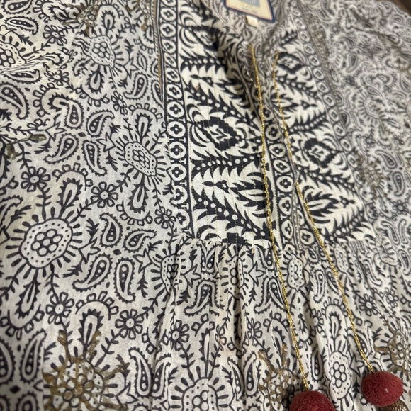 Bell silk boho print with gold chain tassel tie
Bell by Alicia Bell
Silk/cotton - Picture 5 of 9